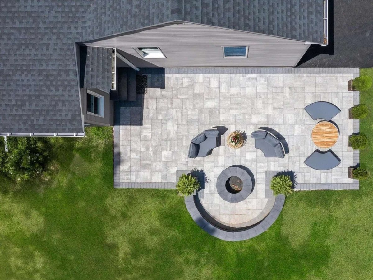 aerial view of backyard patio and firepit in a houghton contracting custom home project in trenton new jersey