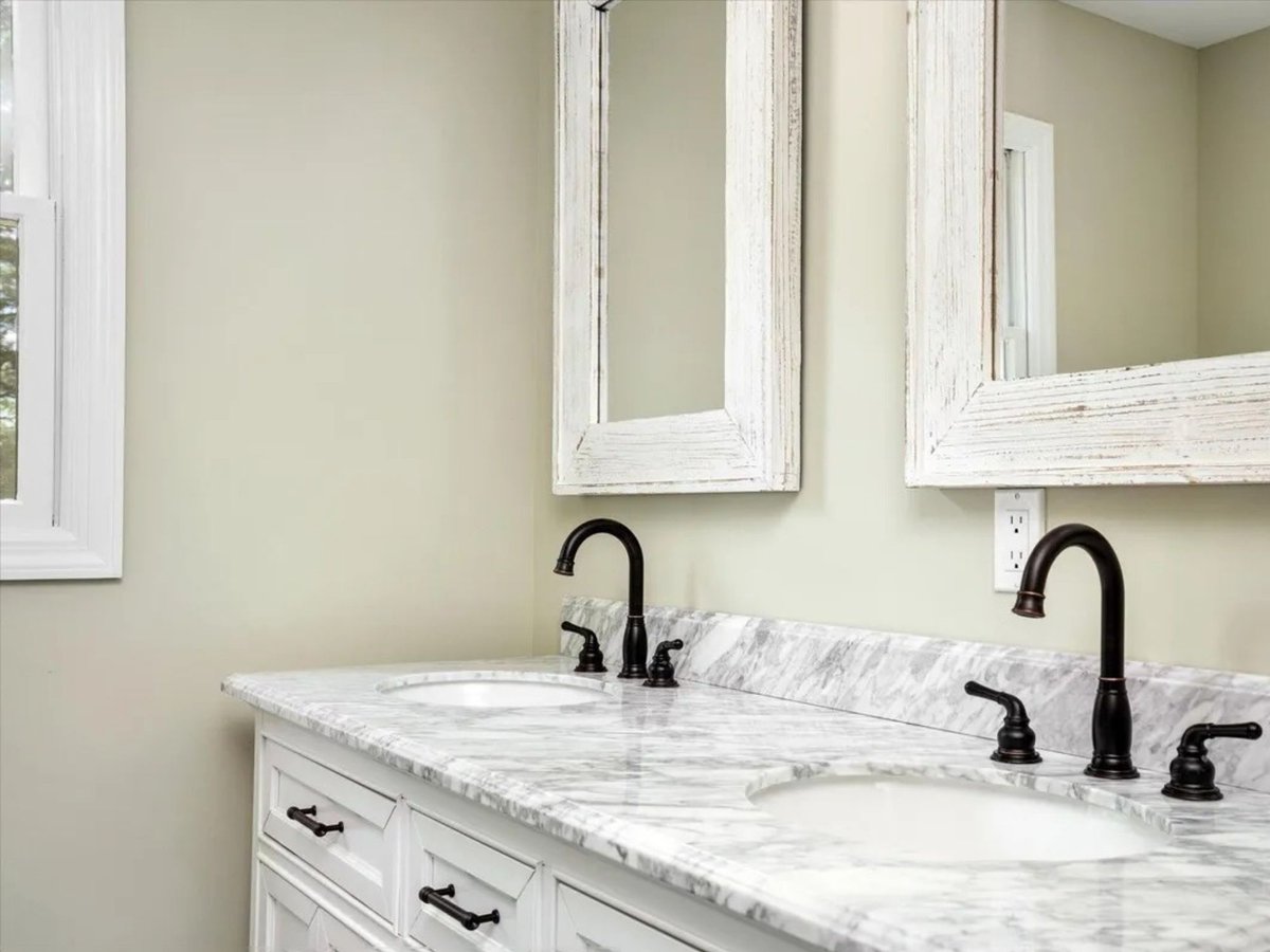 bathroom double vanity with reclaimed wood mirrors in a houghton contracting custom home project in trenton new jersey
