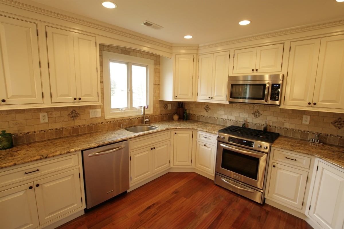 kitchen sink corner with gas range and granite counters custom home project by houghton contracting in newtown pa-optimized
