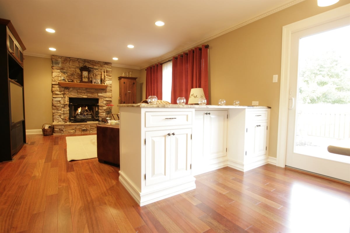 open kitchen and family room with stone fireplace custom home project by houghton contracting in newtown pa-optimized