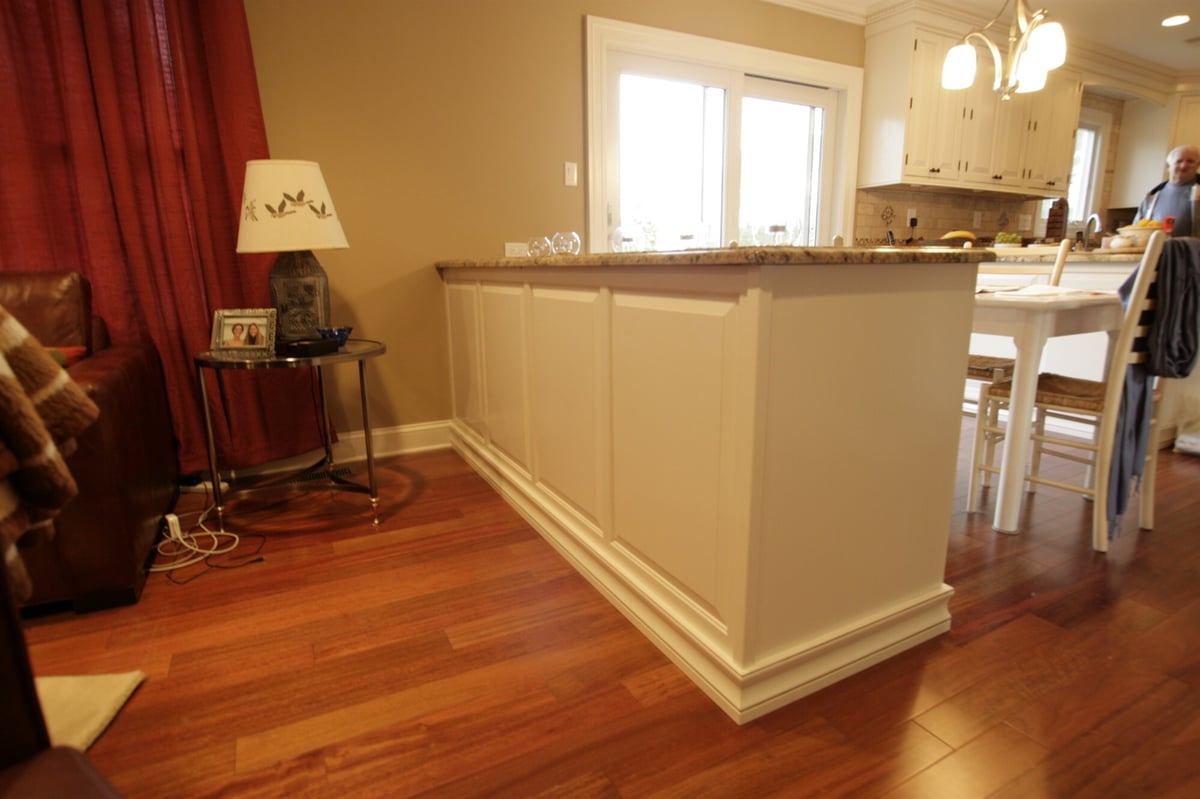 raised bar peninsula with wainscoting from living room custom home project by houghton contracting in newtown pa-optimized