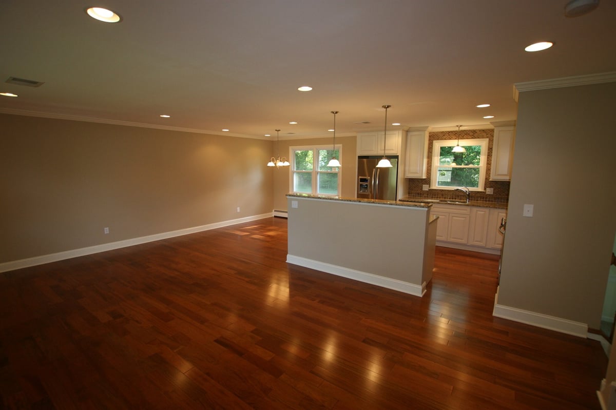 spacious open floor plan with kitchen peninsula and dining area custom home project by houghton contracting in ewing new jersey