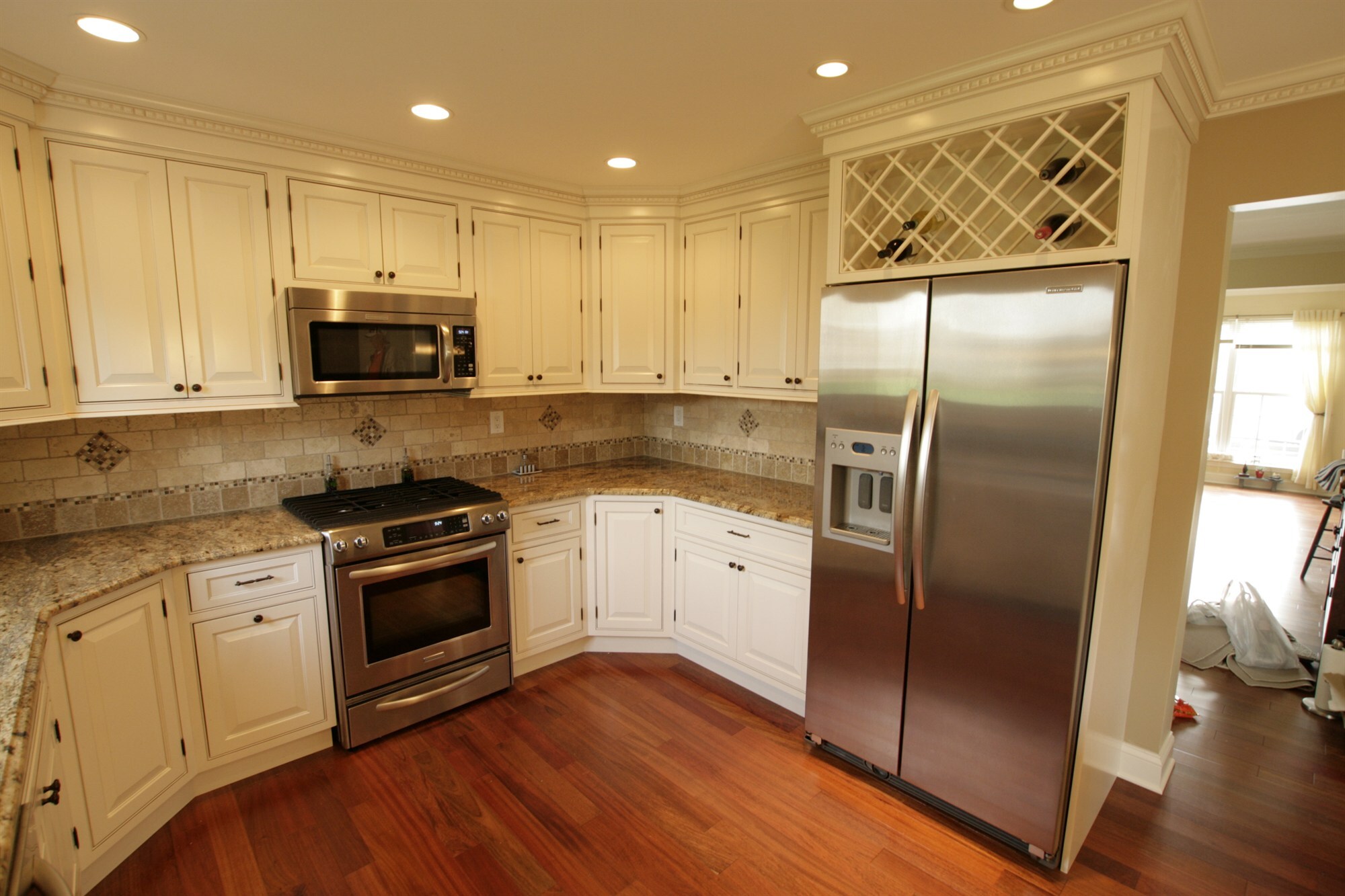 wide angle kitchen with stainless refrigerator wine rack and gas range custom home project by houghton contracting in newtown pa-optimized