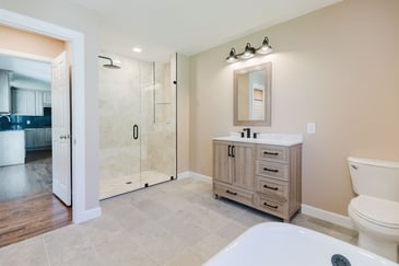 Image of a remodeled bathroom with a glass shower