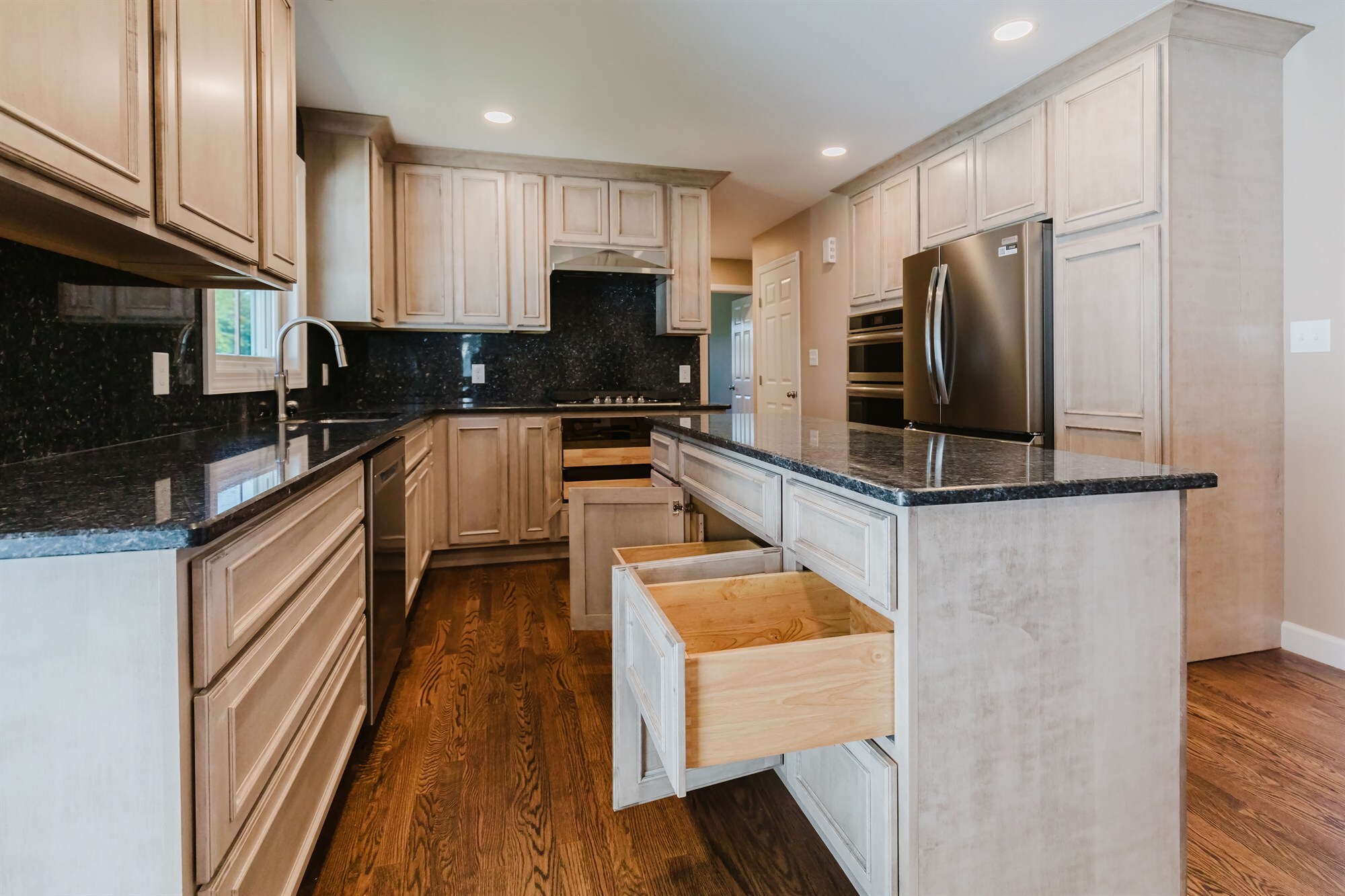 kitchen island with soft close drawers and granite top home addition project by houghton contracting in lawrenceville new jersey-optimized