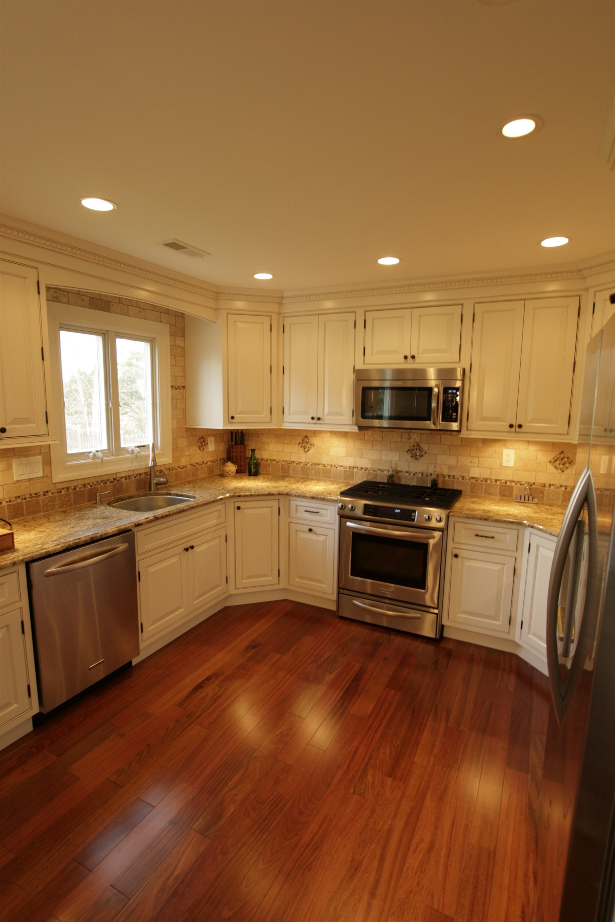u shaped kitchen with gas range dishwasher and window sink custom home project by houghton contracting in newtown pa-optimized