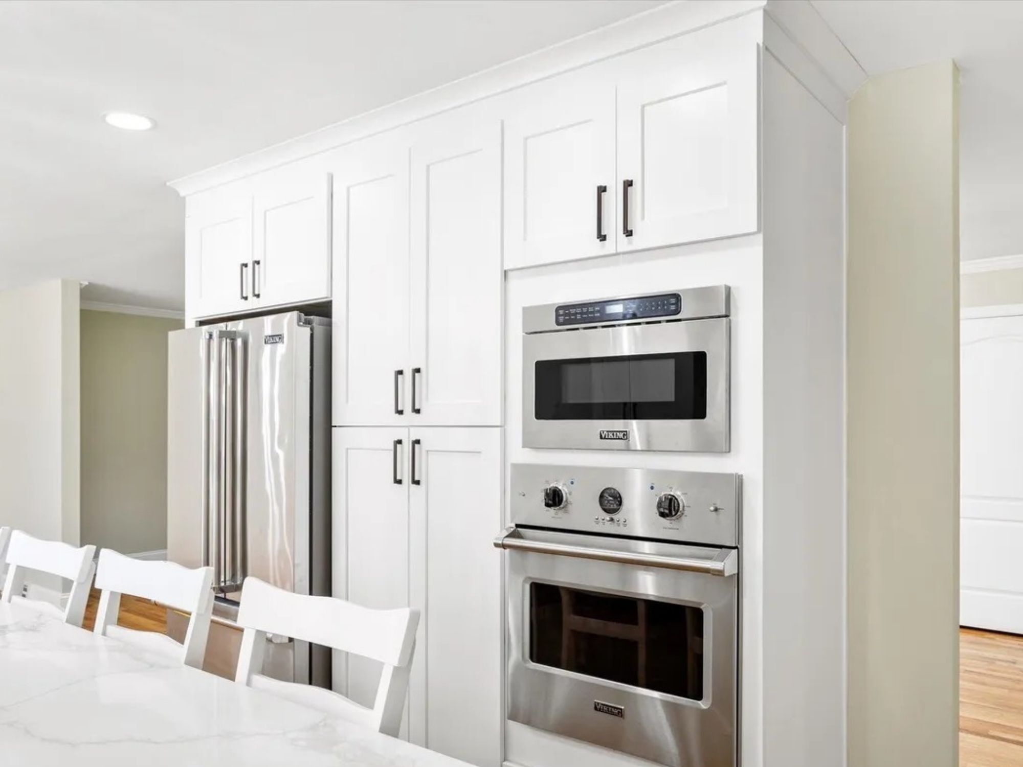kitchen wall of cabinetry with built in oven and microwave in a houghton contracting custom home project in trenton new jersey